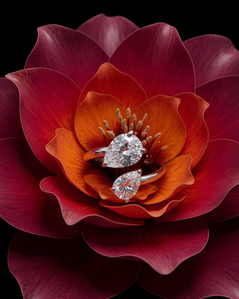 open ring of two pear shape CZ.
