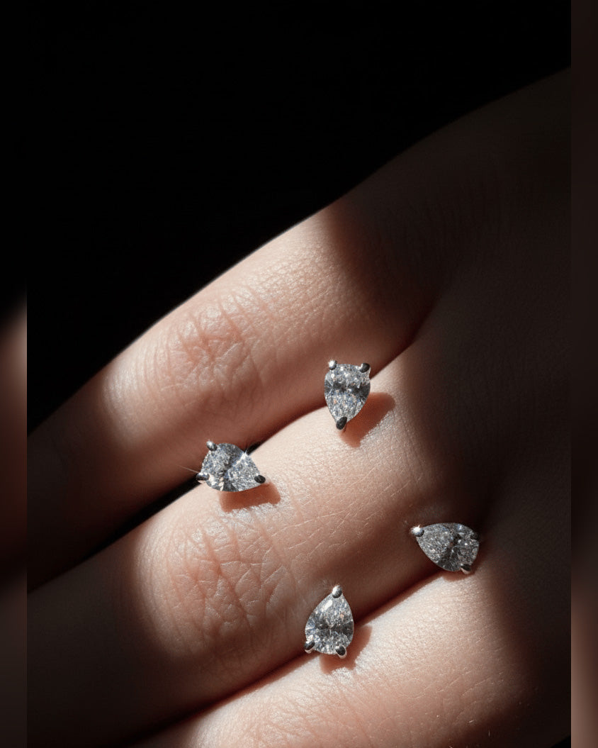 open Fashion ring of four pears stones.