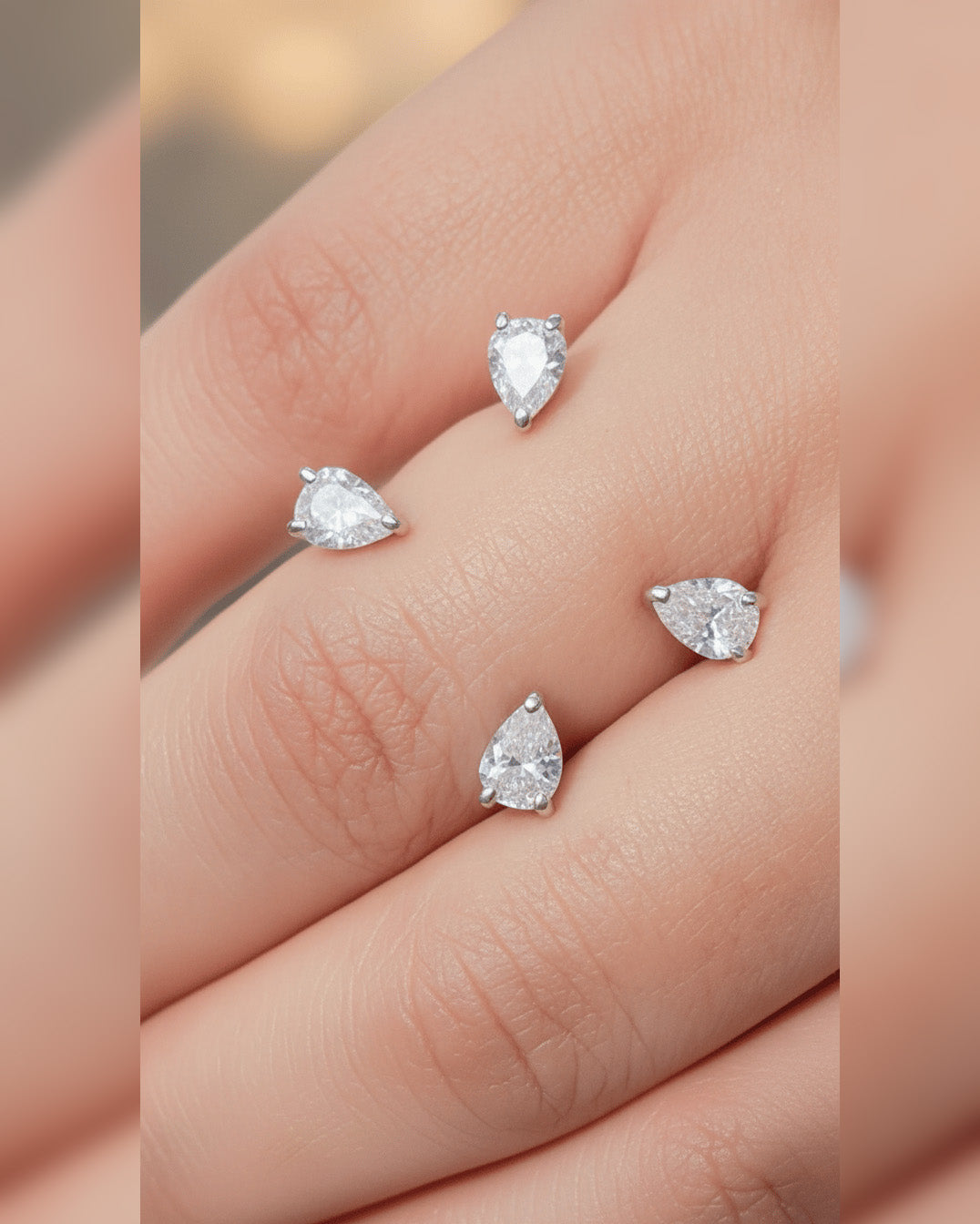 open Fashion ring of four pears stones.