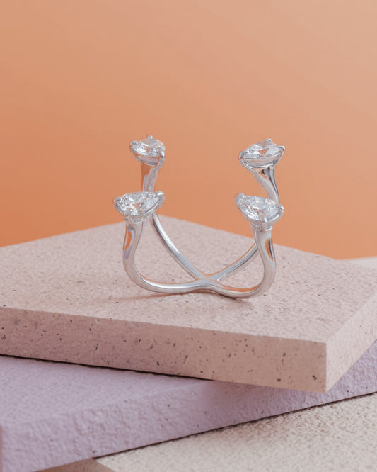 open Fashion ring of four pears stones.