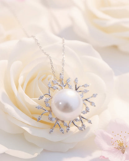 Pearl necklace with CZ stones.