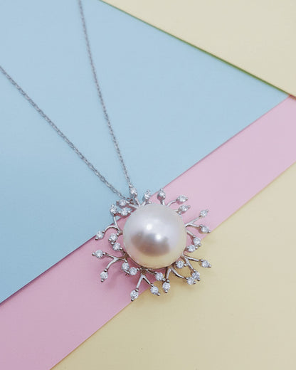 Pearl necklace with CZ stones.