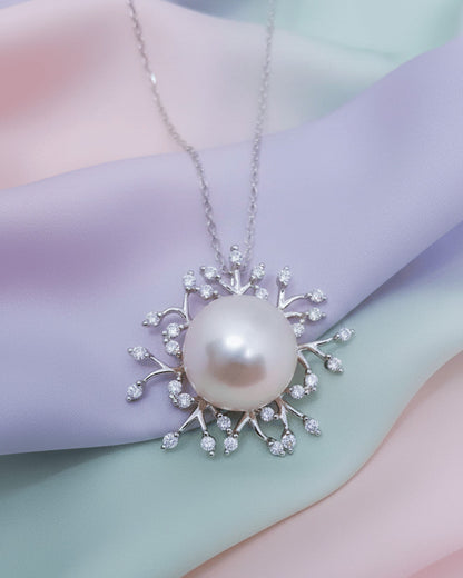 Pearl necklace with CZ stones.