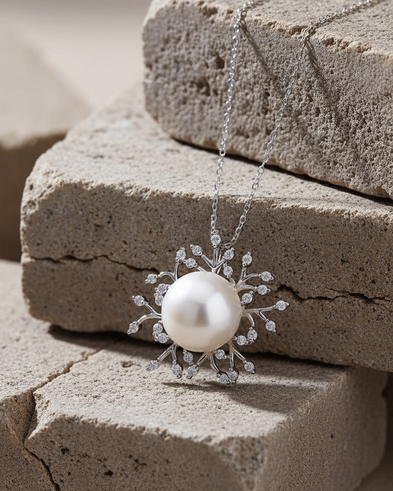 Pearl necklace with CZ stones.