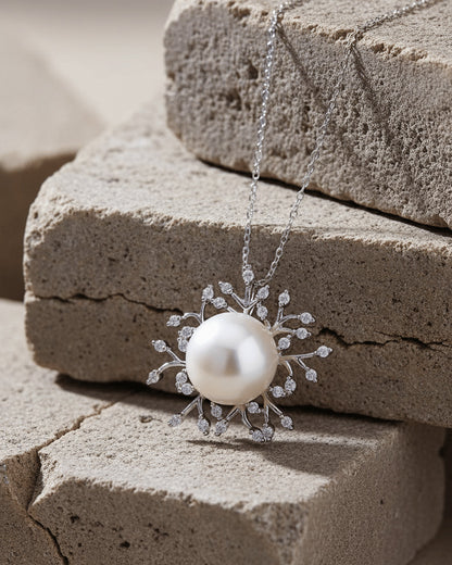 Pearl necklace with CZ stones.