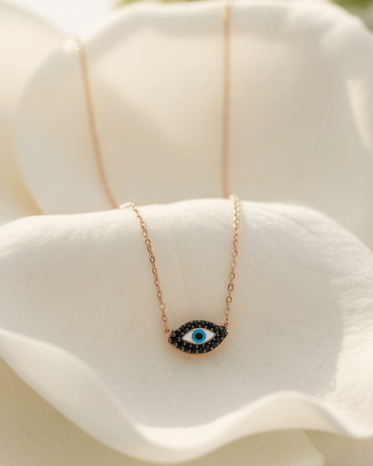 rosegold onyx evil-eye necklace.
