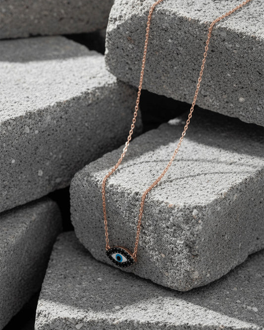 rosegold onyx evil-eye necklace.
