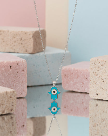 Delicate enamel hamsa shape necklace.