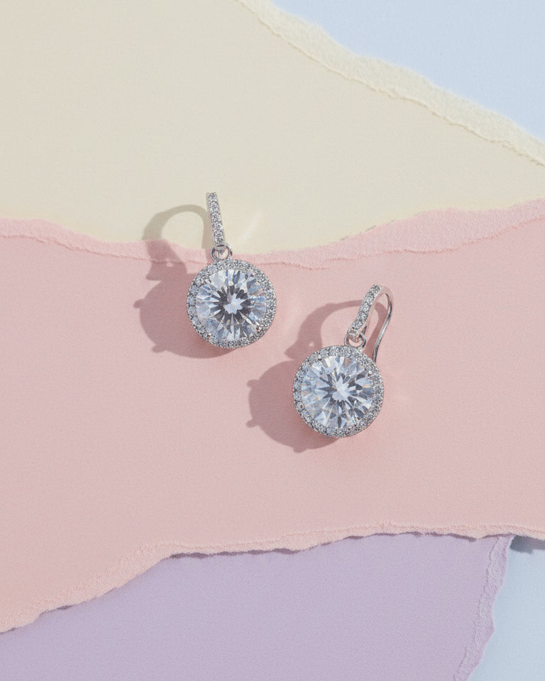 hook earring of round CZ stone in halo setting.