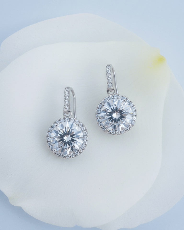 hook earring of round CZ stone in halo setting.