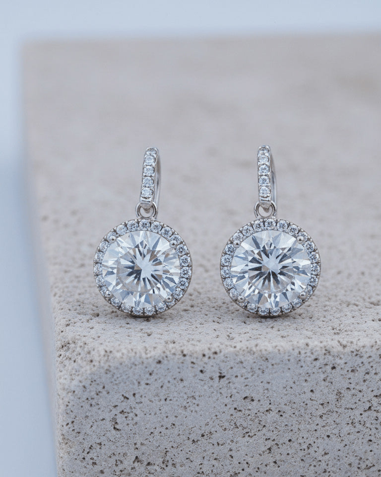 hook earring of round CZ stone in halo setting.