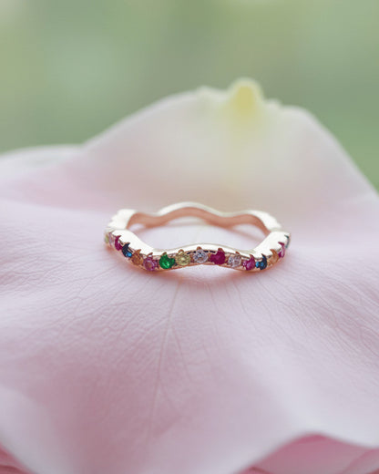 sterling silver wavy eternity rings of rose gold and rhodium color studded with colored CZ.