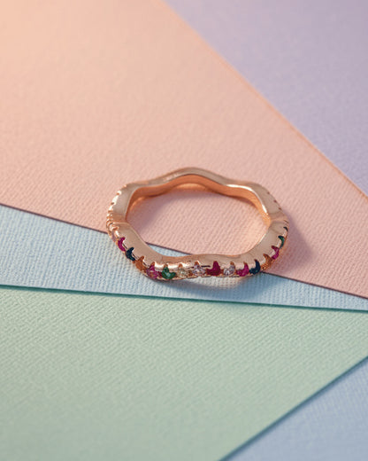 sterling silver wavy eternity rings of rose gold and rhodium color studded with colored CZ.