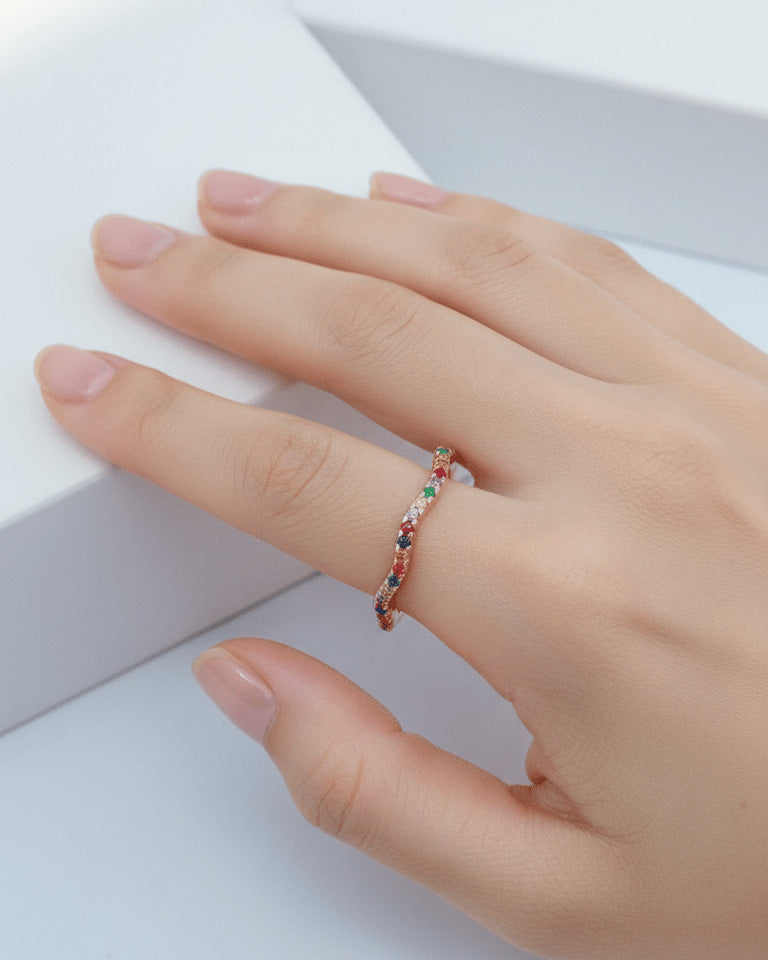 sterling silver wavy eternity rings of rose gold and rhodium color studded with colored CZ.