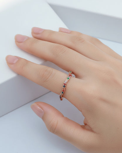 sterling silver wavy eternity rings of rose gold and rhodium color studded with colored CZ.