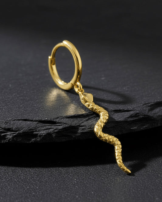 Huggie hoop dangling snake earring.