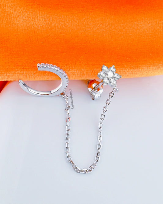 CZ flower shape cluster setting stud earring chain-linked to earcuff.