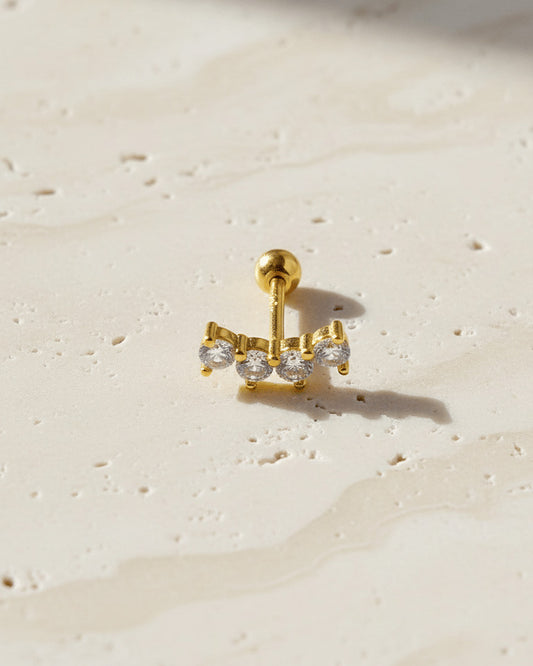 four stones curved shape ballback piercing.