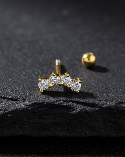 four stones curved shape ballback piercing.