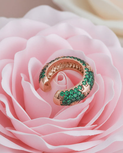rose gold and yellow gold wide earcuffs with ruby and emerald color stones.
