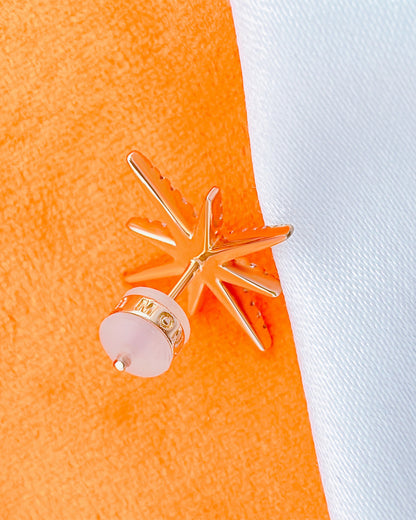 star shape rosegold stud earring.