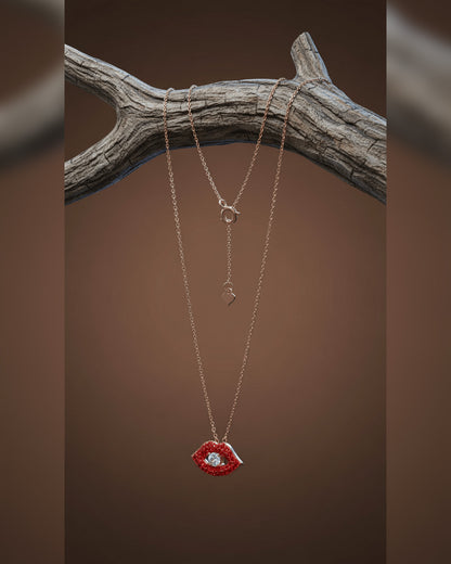 Red lips rosegold necklace.