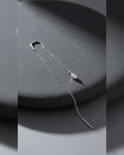 threader earring with dangling marquise shape CZ stone.