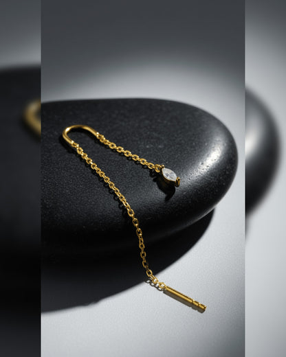 threader earring with dangling marquise shape CZ stone.