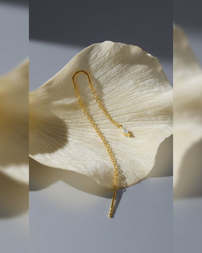 threader earring with dangling marquise shape CZ stone.