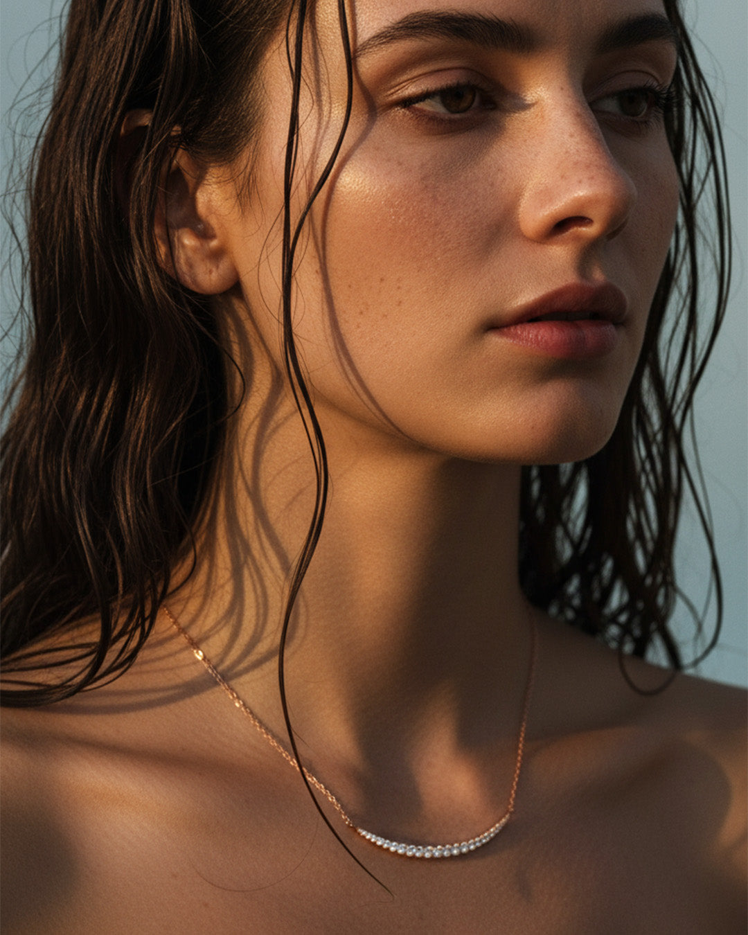 curved bar of graduated cz stones necklace.