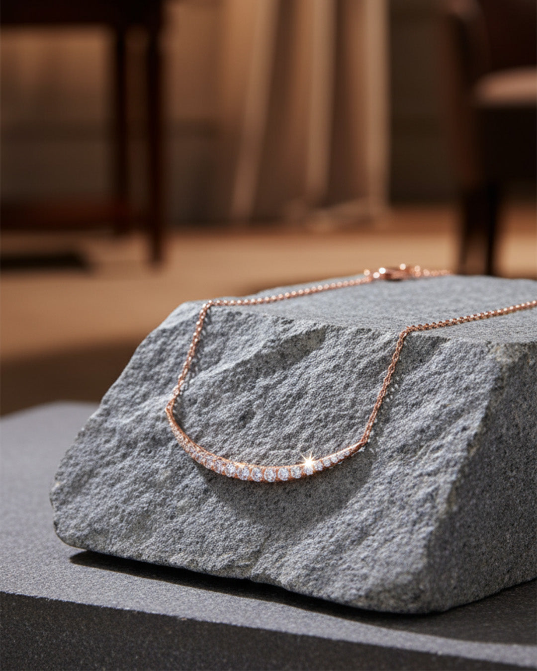 curved bar of graduated cz stones necklace.