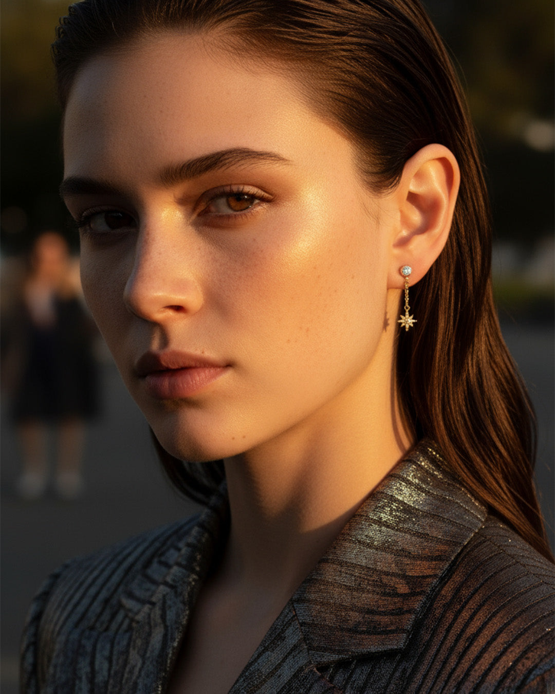 CZ round stone in bezel setting with delicate dangling star shape stud earring.