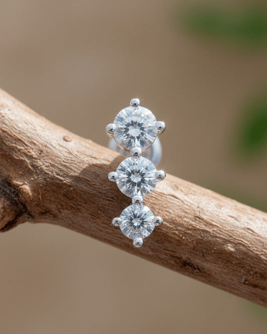 Three graduated round CZ stones stud earring.