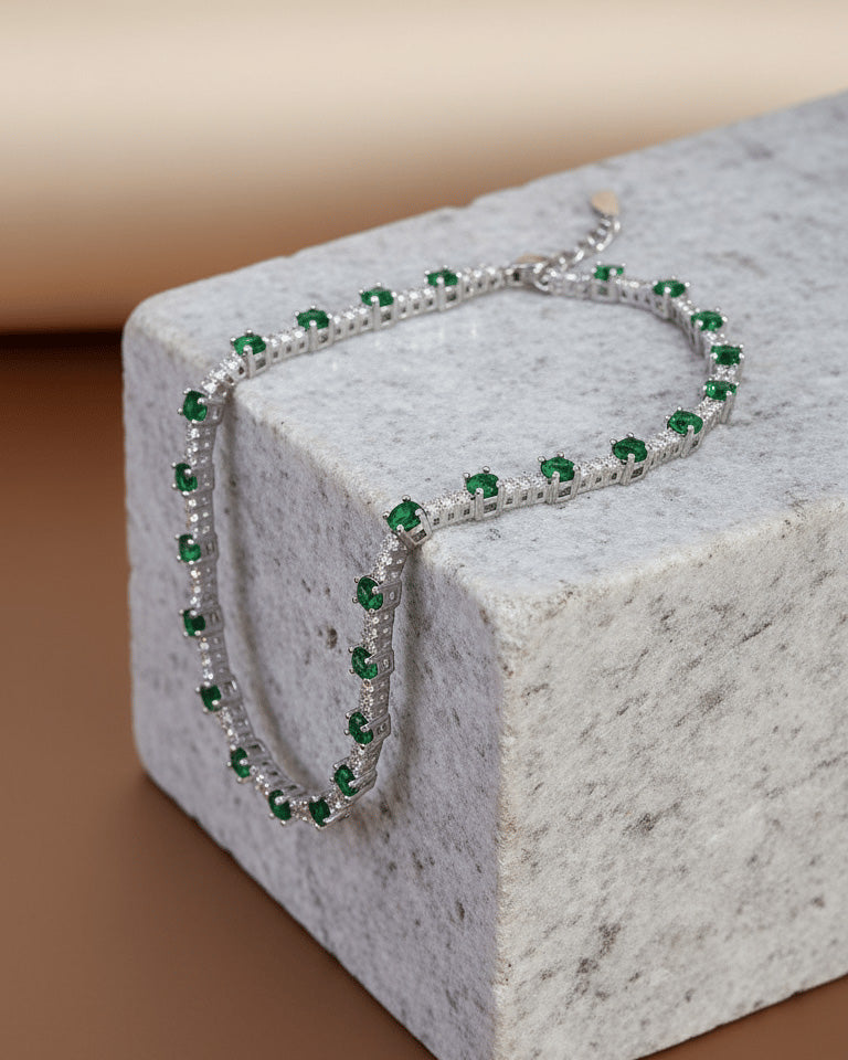 White and green CZ round stones tennis bracelet.