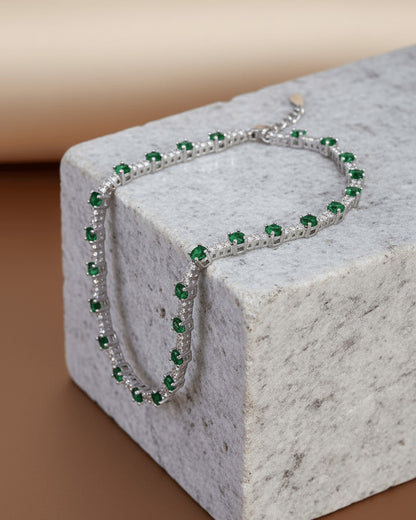 White and green CZ round stones tennis bracelet.