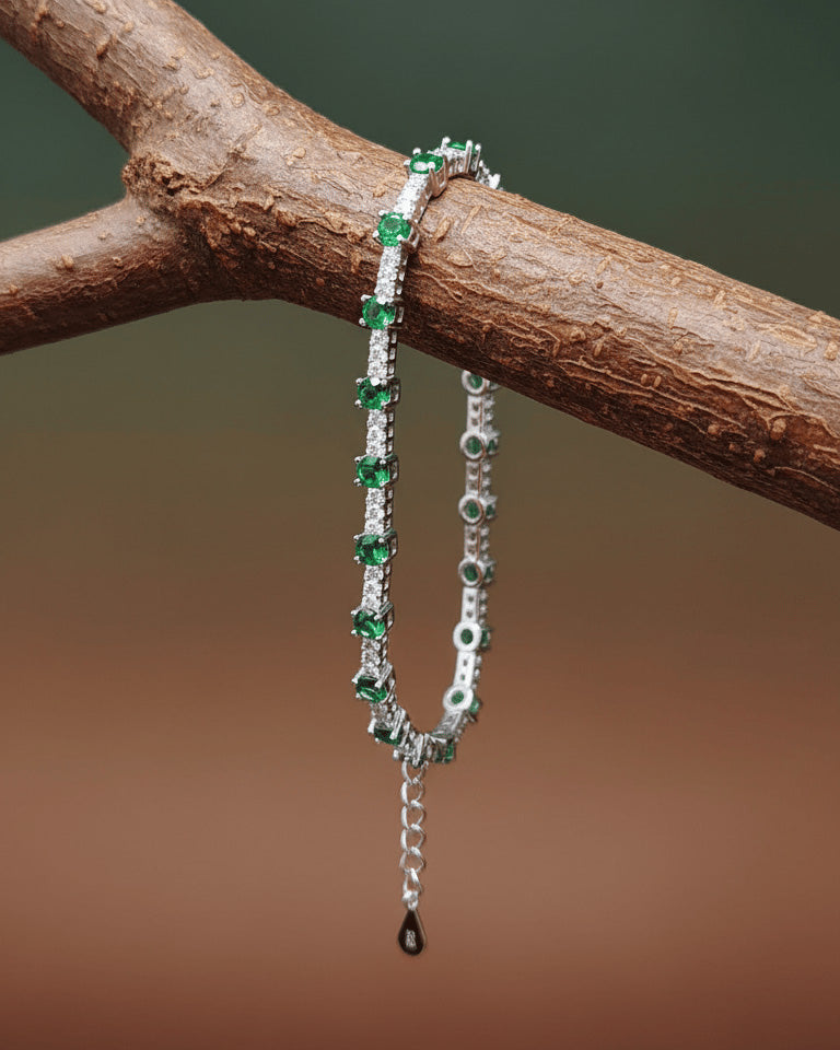 White and green CZ round stones tennis bracelet.
