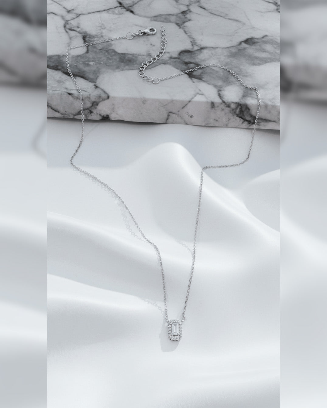 emerald cut diamond style necklace.