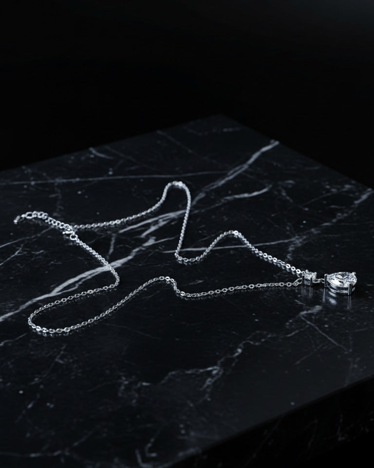 round and tear drop CZ shapes necklace.