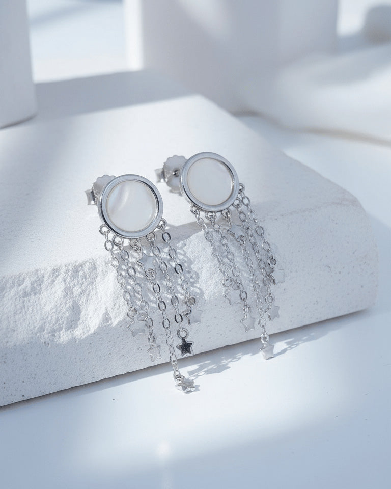 mother of pearl with dangling chains earrings.