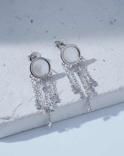 mother of pearl with dangling chains earrings.