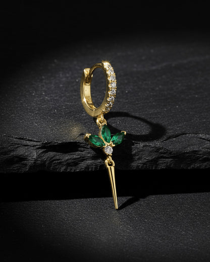 CZ huggie hoop with dangling lotus shape.