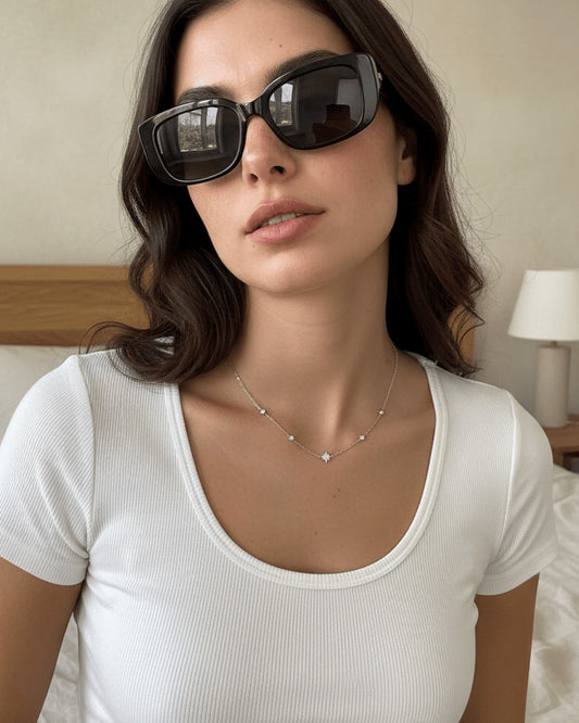 delicate choker of star shape and round CZ in bezel setting.