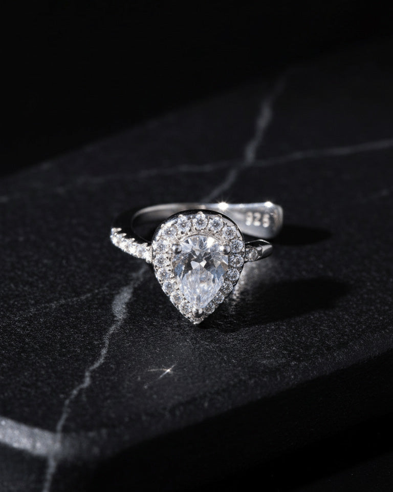 Pear shape CZ in halo setting earcuff.