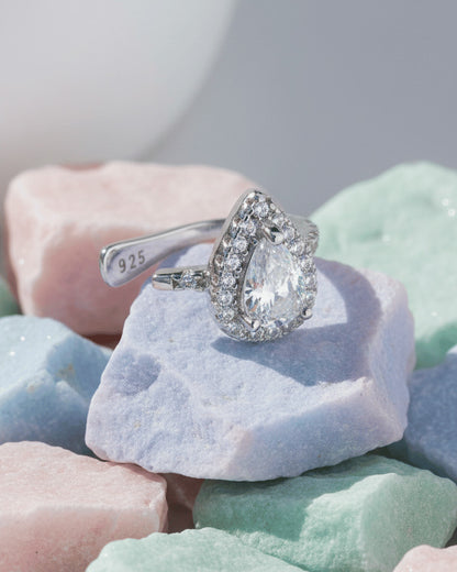 Pear shape CZ in halo setting earcuff.