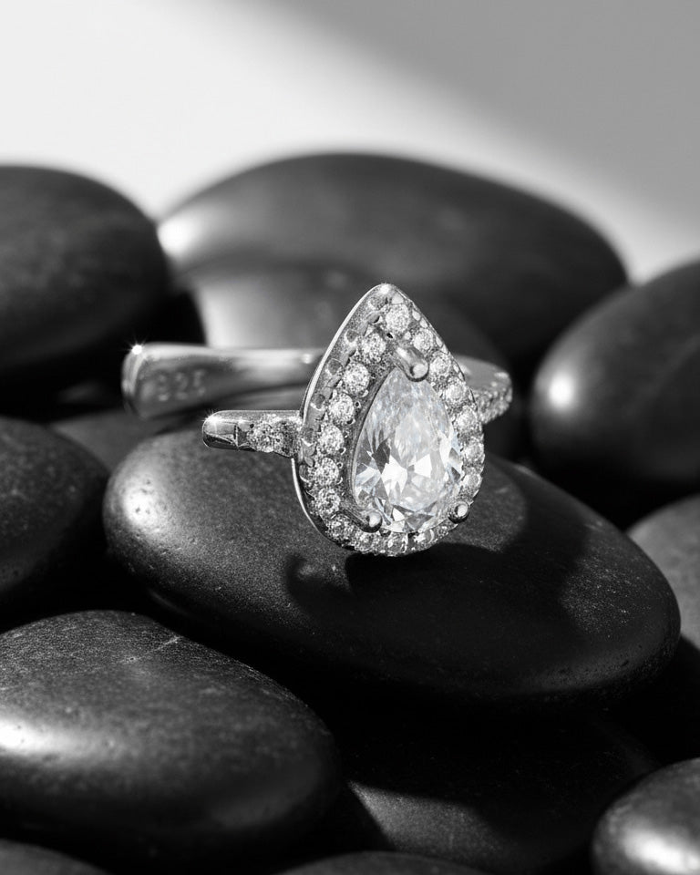 Pear shape CZ in halo setting earcuff.