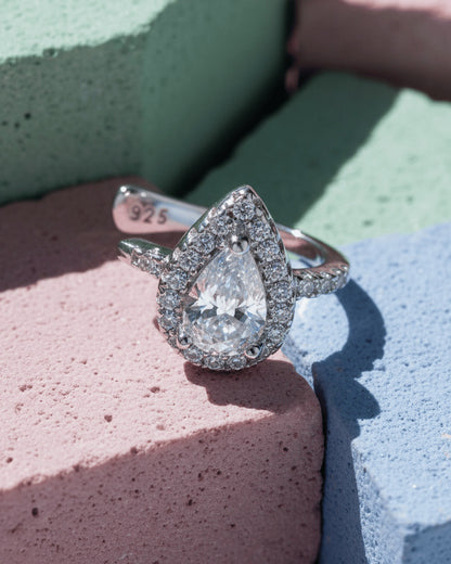 Pear shape CZ in halo setting earcuff.
