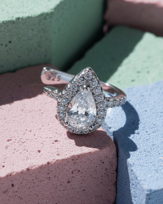 Pear shape CZ in halo setting earcuff.