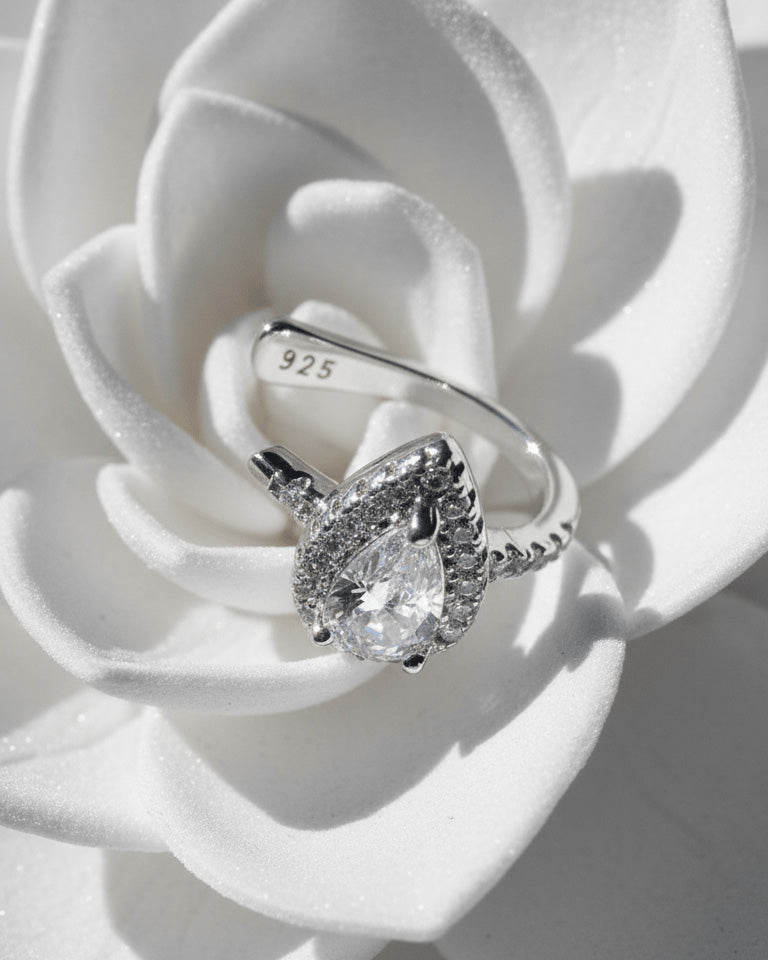 Pear shape CZ in halo setting earcuff.