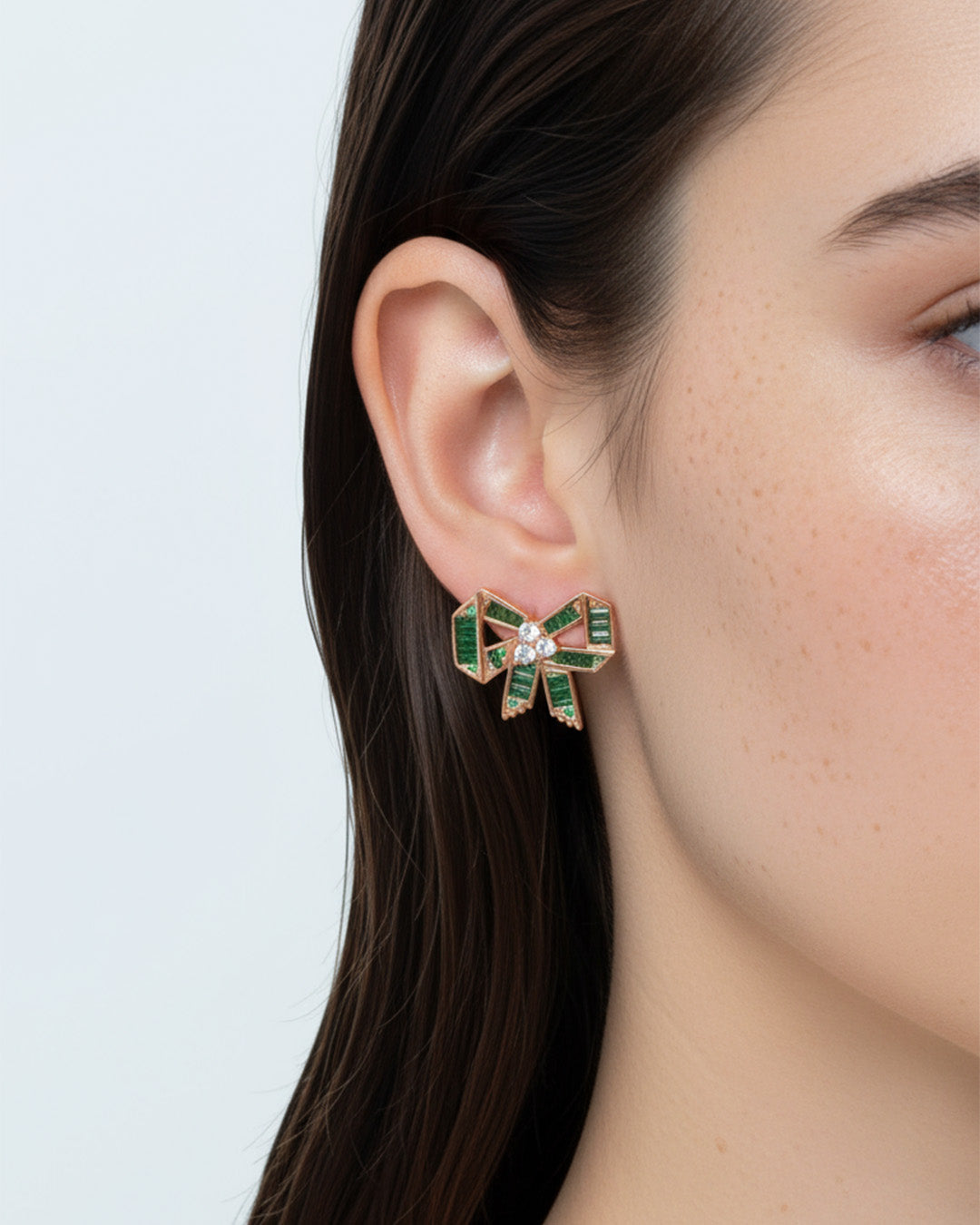 rose gold and emerald CZ color bow shape stud earrings.