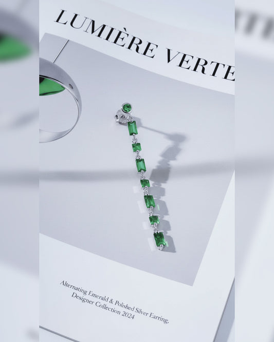 dangling line of round, square, rectanguar emerald color CZ stud earring.